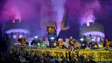 LAS VEGAS, NEVADA - DECEMBER 23: Members of the Vegas Golden Knights Knight Line Drumbots and Vegas Vivas! cheerleaders celebrate in the Castle after a third-period goal by William Carrier #28 against the Colorado Avalanche during their game at T-Mobile Arena on December 23, 2019 in Las Vegas, Nevada. The Avalanche defeated the Golden Knights 7-3. (Photo by Ethan Miller/Getty Images)