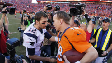 DENVER, CO - JANUARY 19: Tom Brady #12 of the New England Patriots congratulates Peyton Manning #18 of the Denver Broncos after the Broncos defeated the Patriots 26 to 16 during the AFC Championship game at Sports Authority Field at Mile High on January 19, 2014 in Denver, Colorado. (Photo by Kevin C. Cox/Getty Images)