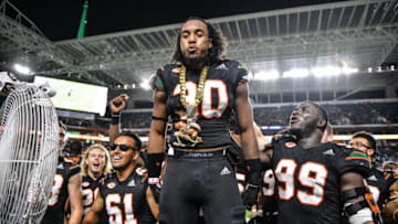 MIAMI, FL - SEPTEMBER 27: Romeo Finley #30 of the Miami Hurricanes displays the "Turnover Chain" on the bench after running back an interception for a touchdown in the fourth quarter against the North Carolina Tar Heels at Hard Rock Stadium on September 27, 2018 in Miami, Florida. (Photo by Mark Brown/Getty Images)