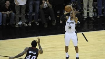 Jun 15, 2014; San Antonio, TX, USA; San Antonio Spurs guard Patty Mills (8) shoots a three point basket against the Miami Heat in game five of the 2014 NBA Finals at AT&T Center. Mandatory Credit: Brendan Maloney-USA TODAY Sports