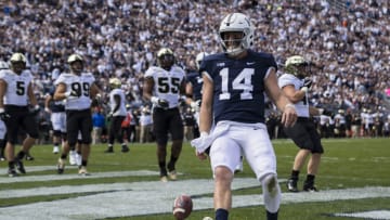 STATE COLLEGE, PA - OCTOBER 05: Sean Clifford #14 of the Penn State Nittany Lions celebrates after rushing for a touchdown against Purdue Boilermakers during the first half at Beaver Stadium on October 5, 2019 in State College, Pennsylvania. (Photo by Scott Taetsch/Getty Images)