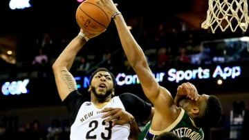Nov 1, 2016; New Orleans, LA, USA; New Orleans Pelicans forward Anthony Davis (23) is fouled by Milwaukee Bucks forward Giannis Antetokounmpo (34) on an attempted dunk during the third quarter of a game at the Smoothie King Center. Mandatory Credit: Derick E. Hingle-USA TODAY Sports