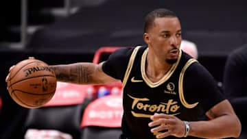 TAMPA, FLORIDA - MARCH 19: Norman Powell #24 of the Toronto Raptors dribbles the ball during the second quarter against the Utah Jazz at Amalie Arena on March 19, 2021 in Tampa, Florida. NOTE TO USER: User expressly acknowledges and agrees that, by downloading and or using this photograph, User is consenting to the terms and conditions of the Getty Images License Agreement. (Photo by Douglas P. DeFelice/Getty Images)