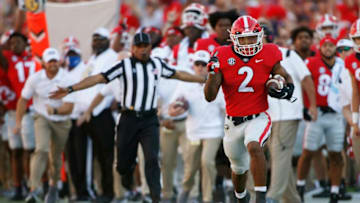 Georgia running back Kendall Milton breaks away down the sideline for a big gain.(Photo By Joshua L Jones, Online Athens)