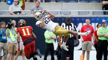 ORLANDO, FL - DECEMBER 28: Chase Claypool #83 of the Notre Dame Fighting Irish makes a diving catch in the end zone for a 24-yard touchdown in the first quarter of the Camping World Bowl against the Iowa State Cyclones at Camping World Stadium on December 28, 2019 in Orlando, Florida. (Photo by Joe Robbins/Getty Images)