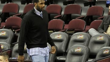Mar 8, 2013; Cleveland, OH, USA; NBA free agent Greg Oden walks along the court after the game between the Memphis Grizzlies and Cleveland Cavaliers 103-92 at Quicken Loans Arena. Mandatory Credit: David Richard-USA TODAY Sports