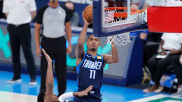 May 14, 2021; Oklahoma City, Oklahoma, USA; Oklahoma City Thunder guard Theo Maledon (11) shoots over Utah Jazz guard Miye Oni (81) during the third quarter at Chesapeake Energy Arena. Mandatory Credit: Alonzo Adams-USA TODAY Sports