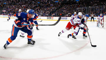 NEW YORK, NY - JANUARY 12: Brock Nelson #29 of the New York Islanders and Adam McQuaid #54 of the New York Rangers at Barclays Center on January 12, 2019 the Brooklyn borough of New York City. (Photo by Mike Stobe/NHLI via Getty Images)
