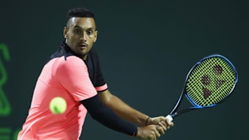 KEY BISCAYNE, FL - MARCH 27: Nick Kyrgios of Australia plays a backhand against Alexander Zverev of Germany in their fourth round match during the Miami Open Presented by Itau at Crandon Park Tennis Center on March 27, 2018 in Key Biscayne, Florida. (Photo by Clive Brunskill/Getty Images)
