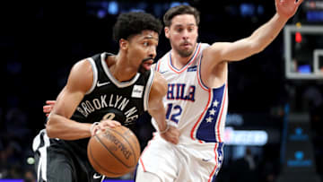 NEW YORK, NY - JANUARY 31: Spencer Dinwiddie #8 of the Brooklyn Nets works against T.J. McConnell #12 of the Philadelphia 76ers in the second quarter during their game at Barclays Center on January 31, 2018 in the Brooklyn borough of New York City. NOTE TO USER: User expressly acknowledges and agrees that, by downloading and or using this photograph, User is consenting to the terms and conditions of the Getty Images License Agreement. (Photo by Abbie Parr/Getty Images)