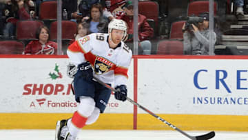 GLENDALE, AZ - DECEMBER 19: Mike Matheson #19 of the Florida Panthers skates with the puck against the Arizona Coyotes at Gila River Arena on December 19, 2017 in Glendale, Arizona. (Photo by Norm Hall/NHLI via Getty Images)