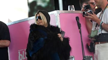 Kourtney Kardashian stands on the side of the stage as her husband Travis Barker performs with his band Blink-182 during the first week-end of Coachella Valley Music and Arts Festival in Indio, California, on April 14, 2023. (Photo by VALERIE MACON / AFP) (Photo by VALERIE MACON/AFP via Getty Images)
