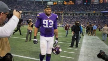 Dec 29, 2013; Minneapolis, MN, USA; Minnesota Vikings defensive tackle Kevin Williams (93) leaves the field after the game with the Detroit Lions at Mall of America Field at H.H.H. Metrodome. The Vikings win 14-13. Mandatory Credit: Bruce Kluckhohn-USA TODAY Sports