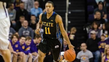 Dec 28, 2014; Cedar Falls, IA, USA; South Dakota State Jackrabbits guard George Marshall (11) dribbles up court against the Northern Iowa Panthers during the 2nd half at McLeod Center. Northern Iowa won 74-63. Mandatory Credit: Jeffrey Becker-USA TODAY Sports