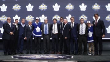 Jun 24, 2016; Buffalo, NY, USA; Auston Matthews poses for a photo with team officials after being selected as the number one overall draft pick by the Toronto Maple Leafs in the first round of the 2016 NHL Draft at the First Niagra Center. Mandatory Credit: Timothy T. Ludwig-USA TODAY Sports