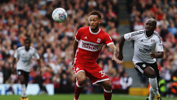 LONDON, ENGLAND - SEPTEMBER 23: Lewis Baker of Middlesbrough holds off the challenge of Neeskens Kebano of Fulham during the Sky Bet Championship match between Fulham and Middlesbrough at Craven Cottage on September 23, 2017 in London, England. (Photo by Ker Robertson/Getty Images)