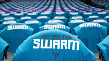 Apr 25, 2016; Charlotte, NC, USA; Enter the Swarm shirts lay on the seats prior to the game between the Charlotte Hornets and the Miami Heat in game four of the first round of the NBA Playoffs at Time Warner Cable Arena. Mandatory Credit: Jeremy Brevard-USA TODAY Sports