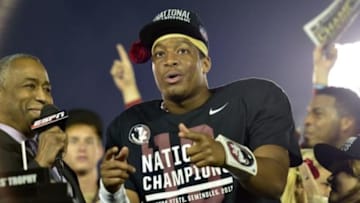 Jan 6, 2014; Pasadena, CA, USA; Florida State Seminoles quarterback Jameis Winston (5) celebrates after winning the 2014 BCS National Championship game against Auburn Tigers 34-31 at the Rose Bowl. Mandatory Credit: Richard Mackson-USA TODAY Sports