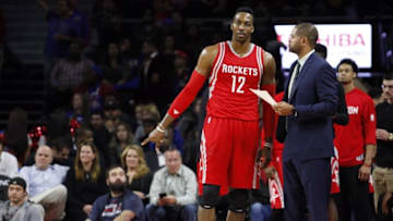 Nov 30, 2015; Auburn Hills, MI, USA; Houston Rockets center Dwight Howard (12) talks to head coach J.B. Bickerstaff during the fourth quarter against the Detroit Pistons at The Palace of Auburn Hills. Pistons win 116-105. Mandatory Credit: Raj Mehta-USA TODAY Sports