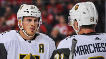 CALGARY, AB - MARCH 8: Nate Schmidt #88 (L) and Jonathan Marchessault #81 of the Vegas Golden Knights confer during a break in play against the Calgary Flames during an NHL game at Scotiabank Saddledome on March 8, 2020 in Calgary, Alberta, Canada. (Photo by Derek Leung/Getty Images)
