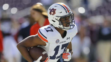 Auburn footballNov 6, 2021; College Station, Texas, USA; Auburn Tigers wide receiver Elijah Canion (17) warms up before playing against the Texas A&M Aggies at Kyle Field. Mandatory Credit: Thomas Shea-USA TODAY Sports