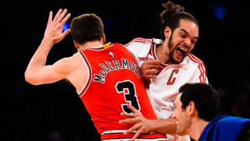 NEW YORK, NY - OCTOBER 29: Joakim Noah #13 of the Chicago Bulls celebrates with Doug McDermott #3 after a play in the fourth quarter during a game at Madison Square Garden on October 29, 2014 in New York City. NOTE TO USER: User expressly acknowledges and agrees that, by downloading and/or using this photograph, user is consenting to the terms and conditions of the Getty Images License Agreement. (Photo by Alex Goodlett/Getty Images)