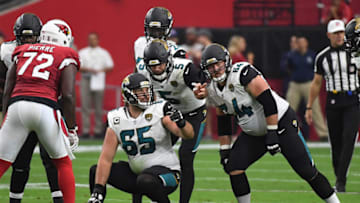 GLENDALE, AZ - NOVEMBER 26: Blake Bortles #5 of the Jacksonville Jaguars talks with Brandon Linder #65 and Chris Reed #64 in the first half of the NFL game against the Arizona Cardinals at University of Phoenix Stadium on November 26, 2017 in Glendale, Arizona. (Photo by Norm Hall/Getty Images)