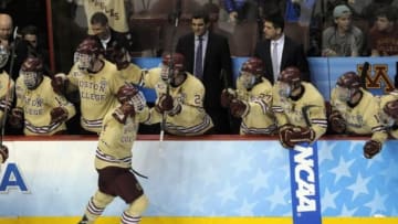 Apr 10, 2014; Philadelphia, PA, USA; Boston College Eagles defenseman Steve Santini (6) celebrates his goal with his teammates against the Union Dutchmen during the second period in the semifinals of the Frozen Four college ice hockey tournament at Wells Fargo Center. Mandatory Credit: Eric Hartline-USA TODAY Sports