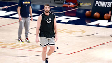 DENVER, COLORADO - FEBRUARY 10: An injured Kevin Love #0 of the Cleveland Cavaliers practices before the game against the Denver Nuggets at Ball Arena on February 10, 2021 in Denver, Colorado. NOTE TO USER: User expressly acknowledges and agrees that, by downloading and/or using this Photograph, user is consenting to the terms and conditions of the Getty Images License Agreement. (Photo by Justin Tafoya/Getty Images)