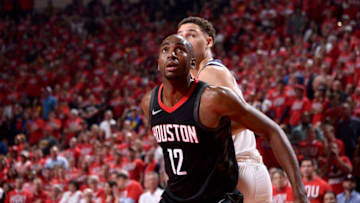 HOUSTON, TX - MAY 14: Luc Mbah a Moute #12 of the Houston Rockets boxes out against the Golden State Warriors in Game One of the Western Conference Finals of the 2018 NBA Playoffs on May 14, 2018 at the Toyota Center in Houston, Texas. NOTE TO USER: User expressly acknowledges and agrees that, by downloading and or using this photograph, User is consenting to the terms and conditions of the Getty Images License Agreement. Mandatory Copyright Notice: Copyright 2018 NBAE (Photo by Bill Baptist/NBAE via Getty Images)