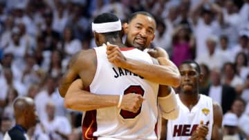 MIAMI, FL - JUNE 21: Juwan Howard #5 of the Miami Heat celebrates with LeBron James #6 late in the fourth quarter against the Oklahoma City Thunder in Game Five of the 2012 NBA Finals on June 21, 2012 at American Airlines Arena in Miami, Florida. NOTE TO USER: User expressly acknowledges and agrees that, by downloading and or using this photograph, User is consenting to the terms and conditions of the Getty Images License Agreement. (Photo by Ronald Martinez/Getty Images)