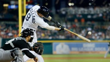 DETROIT, MI - MAY 25: Nicholas Castellanos #9 of the Detroit Tigers doubles to drive in Leonys Martin of the Detroit Tigers and tie the game at 4-4 as Omar Narvaez #38 of the Chicago White Sox works behind the plate during the eighth inning at Comerica Park on May 25, 2018 in Detroit, Michigan. (Photo by Duane Burleson/Getty Images)
