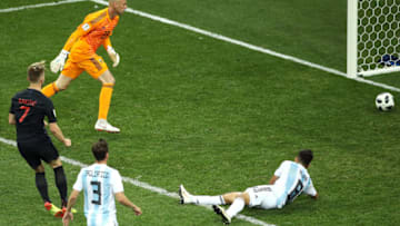 NIZHNY NOVGOROD, RUSSIA - JUNE 21: Ivan Rakitic of Croatia scores his team's third goal past Wilfredo Caballero of Argentina during the 2018 FIFA World Cup Russia group D match between Argentina and Croatia at Nizhny Novgorod Stadium on June 21, 2018 in Nizhny Novgorod, Russia. (Photo by Clive Mason/Getty Images)