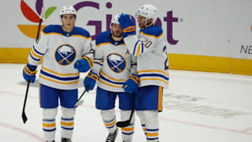 Sep 25, 2022; Washington, District of Columbia, USA; Buffalo Sabres center Vinnie Hinostroza (29) celebrates with teammates after scoring the game winning goal in over time against Washington Capitals at Capital One Arena. Mandatory Credit: Amber Searls-USA TODAY Sports