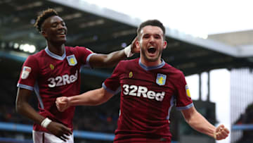 BIRMINGHAM, ENGLAND - MARCH 16: John McGinn of Aston Villa celebrates his goal with Tammy Abraham of Aston Villa during the Sky Bet Championship match between Aston Villa and Middlesbrough at Villa Park on March 16, 2019 in Birmingham, England. (Photo by Matthew Lewis/Getty Images)