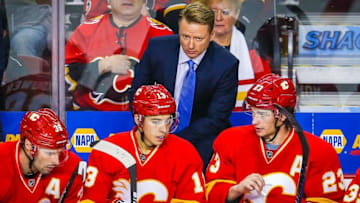 Oct 14, 2016; Calgary, Alberta, CAN; Calgary Flames head coach Glen Gulutzan on his bench against Edmonton Oilers during the third period at Scotiabank Saddledome. Edmonton Oilers won 5-3. Mandatory Credit: Sergei Belski-USA TODAY Sports