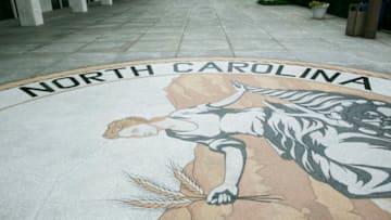 UNITED STATES - MAY 9 - The great seal of North Carolina is seen outside the state legislature building in Raleigh, N.C., on Monday, May 9, 2016. Gov. Pat McCrory and his administration sued the federal government Monday in a fight for a state law that requires transgender people to use the public restroom matching the sex on their birth certificate. (Photo By Al Drago/CQ Roll Call)