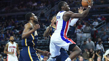 Jan 3, 2017; Auburn Hills, MI, USA; Detroit Pistons guard Reggie Jackson (1) goes to the basket against Indiana Pacers forward Thaddeus Young (21) during the third quarter at The Palace of Auburn Hills. Mandatory Credit: Tim Fuller-USA TODAY Sports