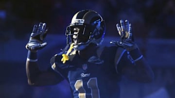 Nov 30, 2014; St. Louis, MO, USA; St. Louis Rams wide receiver Tavon Austin (11) puts his hands up to show support for Michael Brown before a game against the Oakland Raiders at the Edward Jones Dome. Mandatory Credit: Jeff Curry-USA TODAY Sports