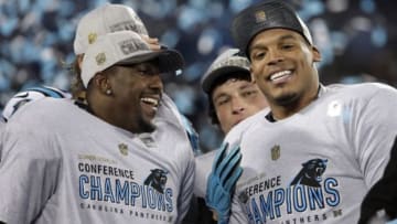 Jan 24, 2016; Charlotte, NC, USA; Carolina Panthers quarterback Cam Newton (1) and outside linebacker Thomas Davis (58) celebrates after beating the Arizona Cardinals in the NFC Championship football game at Bank of America Stadium. Mandatory Credit: Jeremy Brevard-USA TODAY Sports