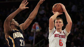 Dec 20, 2016; New York, NY, USA; New York Knicks forward Kristaps Porzingis (6) shoots over Indiana Pacers forward Thaddeus Young (21) during the second half at Madison Square Garden. Mandatory Credit: Adam Hunger-USA TODAY Sports