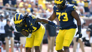 ANN ARBOR, MI - SEPTEMBER 9: Michigan's Devn Bush, left, takes a bow after he and Maurice Hurst, right, teamed up to sack Cincinnati quarterback Hayden Moore during a college football game between the Cincinnati Bearcats and the Michigan Wolverines on September 9, 2017 at Michigan Stadium in Ann Arbor, MI. (Photo by Lon Horwedel/Icon Sportswire via Getty Images)