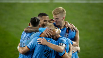 HARRISON, NJ - AUGUST 29: Captain Alexander Ring #8 of New York City huddles to celebrate his goal with teammates in the second half to take the lead in the Major League Soccer match against Chicago Fire at Red Bull Arena on August 29, 2020 in Harrison, New Jersey. (Photo by Ira L. Black - Corbis/Getty Images)