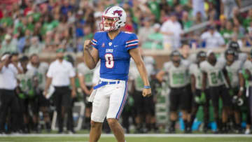 DALLAS, TX - SEPTEMBER 9: Ben Hicks #8 of the SMU Mustangs celebrates after throwing a touchdown against the North Texas Mean Green during the first half at Gerald J. Ford Stadium on September 9, 2017 in Dallas, Texas. (Photo by Cooper Neill/Getty Images)