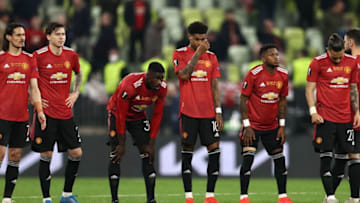 Manchester United's players react to their defeat in the UEFA Europa League final football match between Villarreal CF and Manchester United at the Gdansk Stadium in Gdansk on May 26, 2021. (Photo by MAJA HITIJ / various sources / AFP) (Photo by MAJA HITIJ/AFP via Getty Images)
