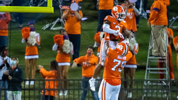 Oct 3, 2020; Clemson, South Carolina, USA; Clemson offensive tackle Jackson Carman (79) and Clemson wide receiver Amari Rodgers (3) celebrate RogersÕ touchdown during their game against Virginia at Memorial Stadium. Mandatory Credit: Ken Ruinard-USA TODAY Sports