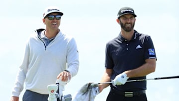 PONTE VEDRA BEACH, FLORIDA - MARCH 13: Dustin Johnson of the United States and his caddie and brother Austin Johnson look on during a practice round for The PLAYERS Championship on The Stadium Course at TPC Sawgrass on March 13, 2019 in Ponte Vedra Beach, Florida. (Photo by Sam Greenwood/Getty Images)