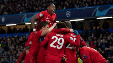 LONDON, ENGLAND - FEBRUARY 25: David Alaba of FC Bayern Munchen jumps on team mates in celebration after Serge Gnabry scores the second goal during the UEFA Champions League round of 16 first leg match between Chelsea FC and FC Bayern Muenchen at Stamford Bridge on February 25, 2020 in London, United Kingdom. (Photo by Visionhaus)