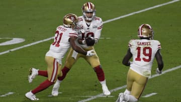 Jimmy Garoppolo, Raheem Mostert, San Francisco 49ers. (Photo by Focus on Sport/Getty Images)