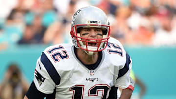 Jan 1, 2017; Miami Gardens, FL, USA; New England Patriots quarterback Tom Brady (12) yells out at the line of scrimmage during the second half against the Miami Dolphins at Hard Rock Stadium. Mandatory Credit: Steve Mitchell-USA TODAY Sports